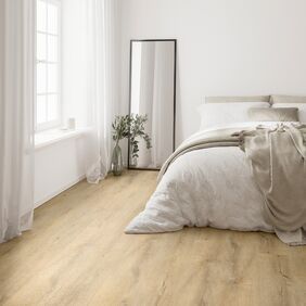 Wood effect flooring straight laid in a bedroom