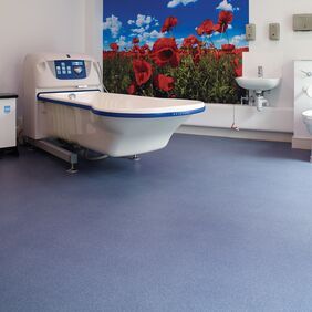 Blue quartz safety flooring in a Aged/Residential Care setting bathroom