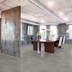 Concrete effect flooring in a modern commercial office space
