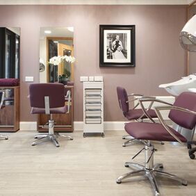 Light oak effect flooring in a hairdressers within Aged/Residential Care