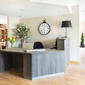 Brown oak wood effect flooring in a Aged/residential care reception area
