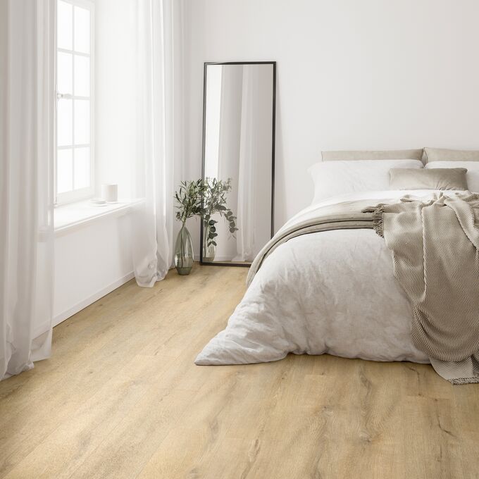 Wood effect flooring straight laid in a bedroom
