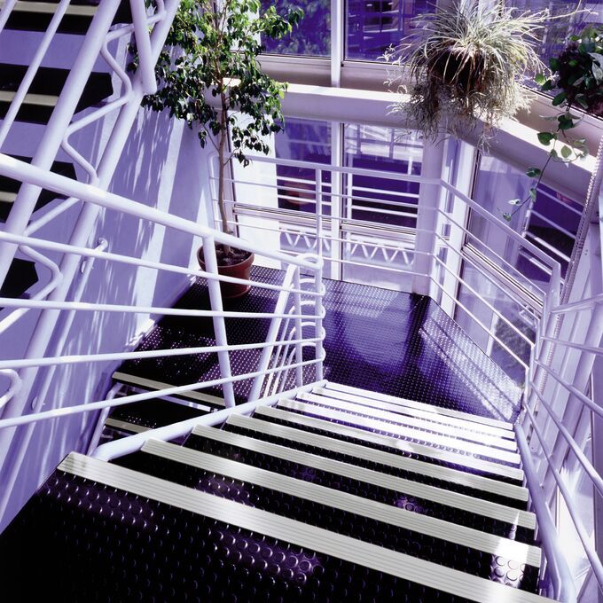 Commercial stairway with black flooring