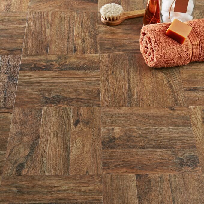 Detailed image of the Georgian Parquet dark wood flooring with bathroom accessories 