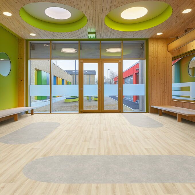 Light cement effect flooring laid in a school waiting area