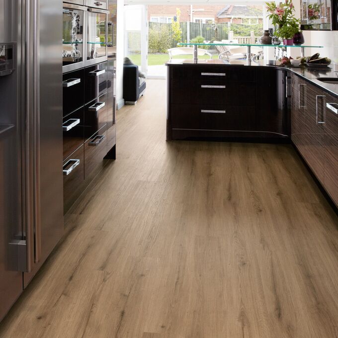 Modern kitchen area with Natural Oak flooring 