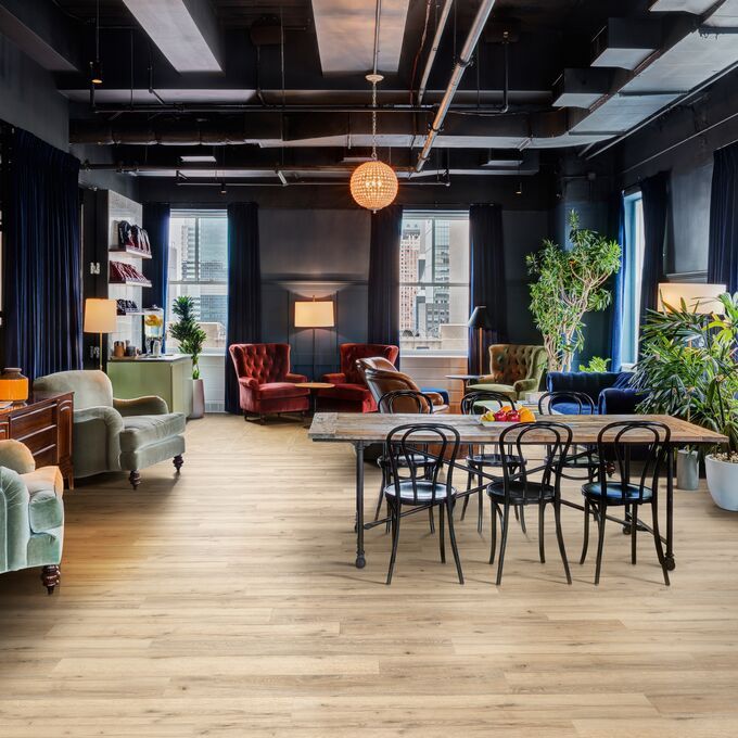 Oak effect flooring straight laid in a commercial chill out zone