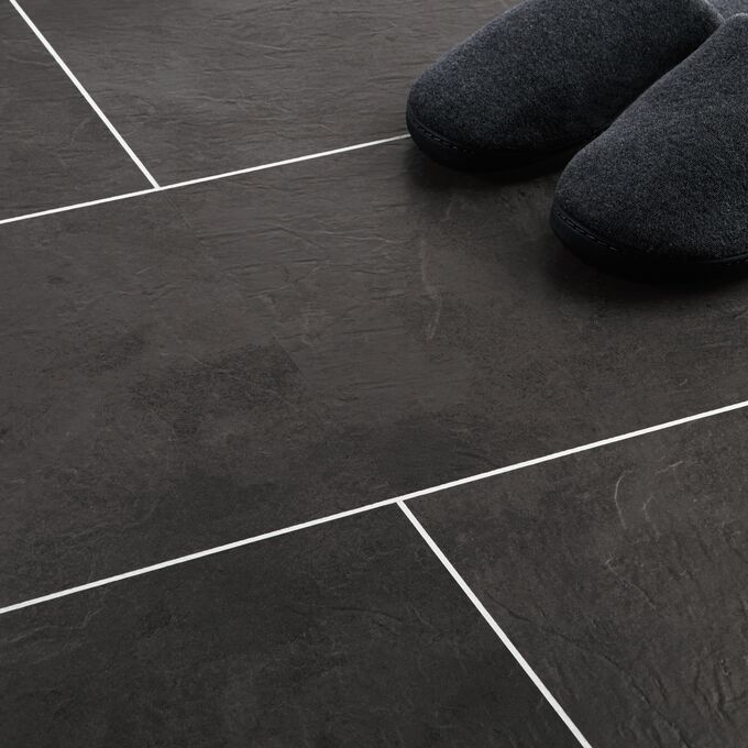 Close up of srone effect flooring in Atlantic Slate using Large square tile effect, laid brickwork with Pearl Grouting Strip.