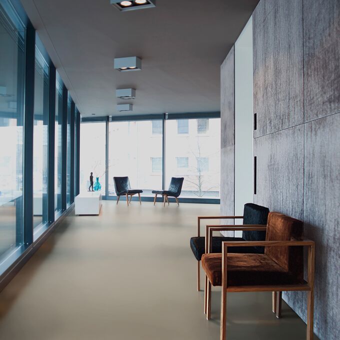 Modern commercial corridor with chairs