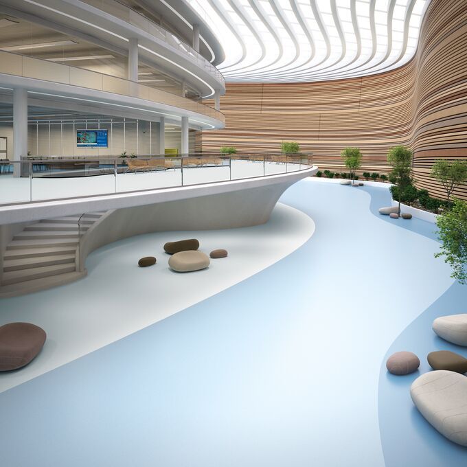 Healthcare entrance hall with three different shades of blue flooring