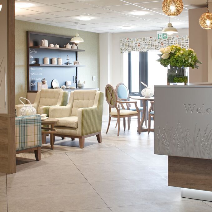Reception area with grey concrete effect flooring 
