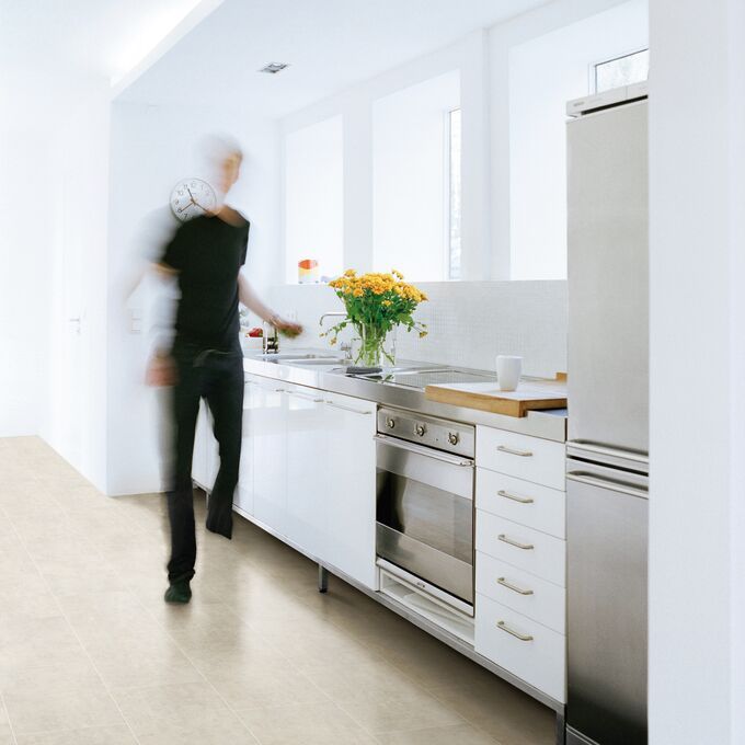 Modern kitchen featuring Stone effect flooring in White Metalstone Brickwork laid design with Ice Grouting Strip. 