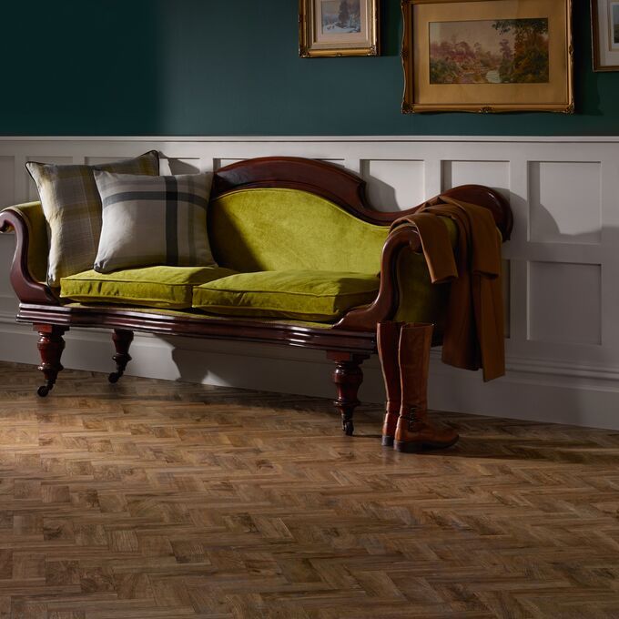 Chaise lounge seating area featuring dark wood effect Georgian Parquet flooring 