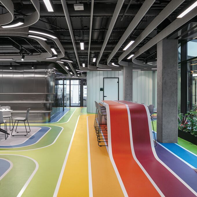 Multi coloured Polyflor flooring laid in an open office
