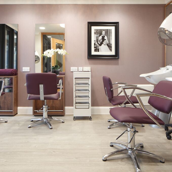 Light oak effect flooring in a hairdressers within Aged/Residential Care