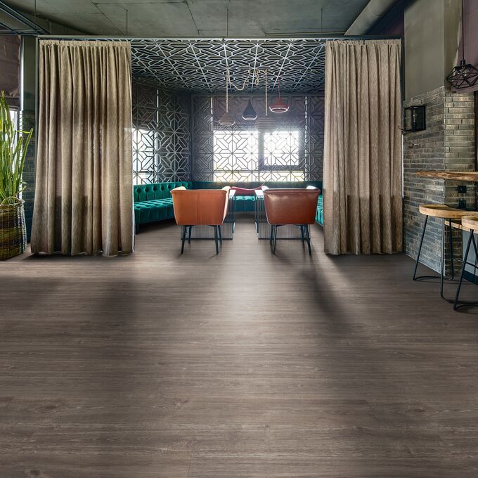 Dark oak effect flooring a in a trendy restaurant